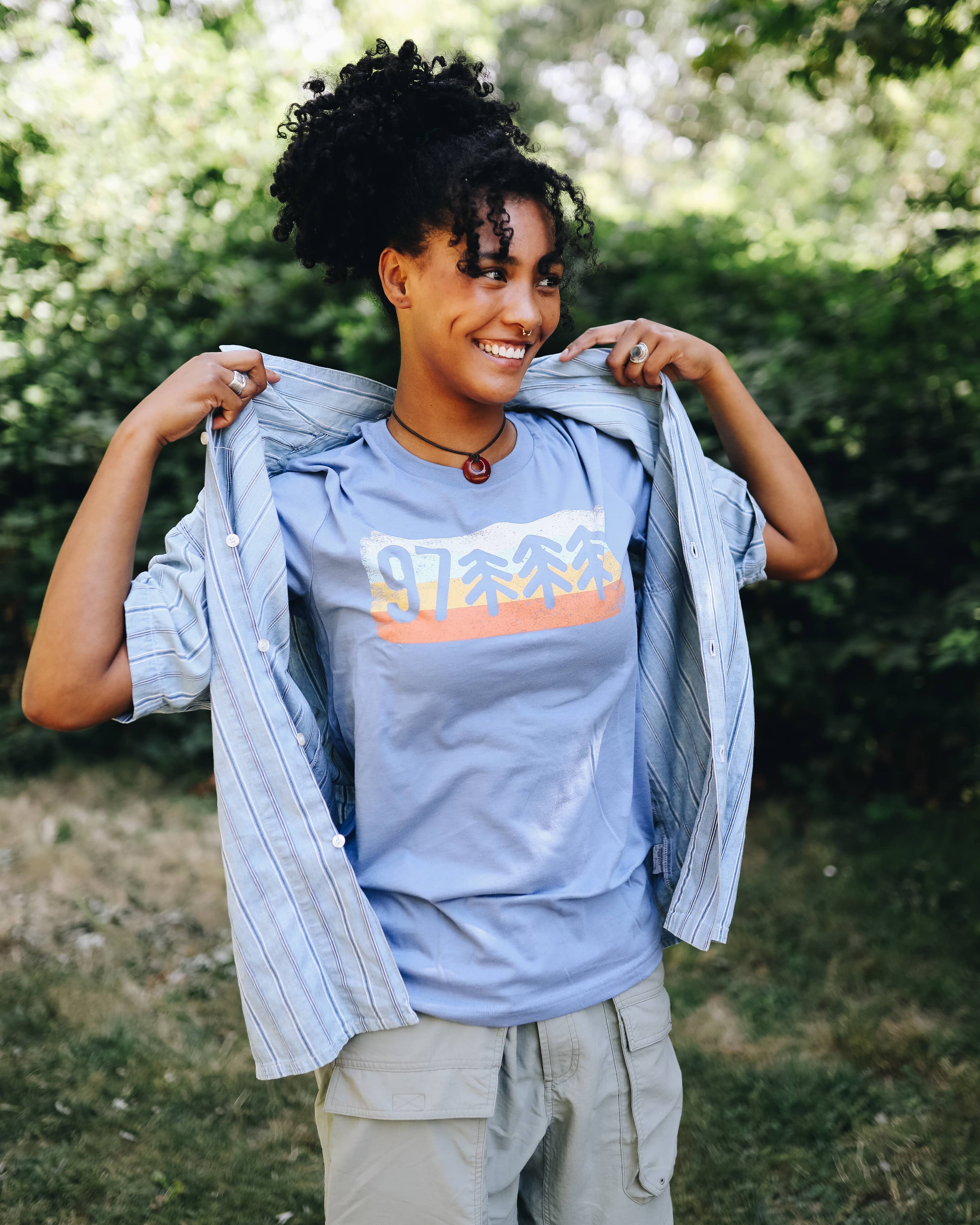 Model is 5'9 wearing 97XXX Short Sleeve T-Shirt in Dusty Blue