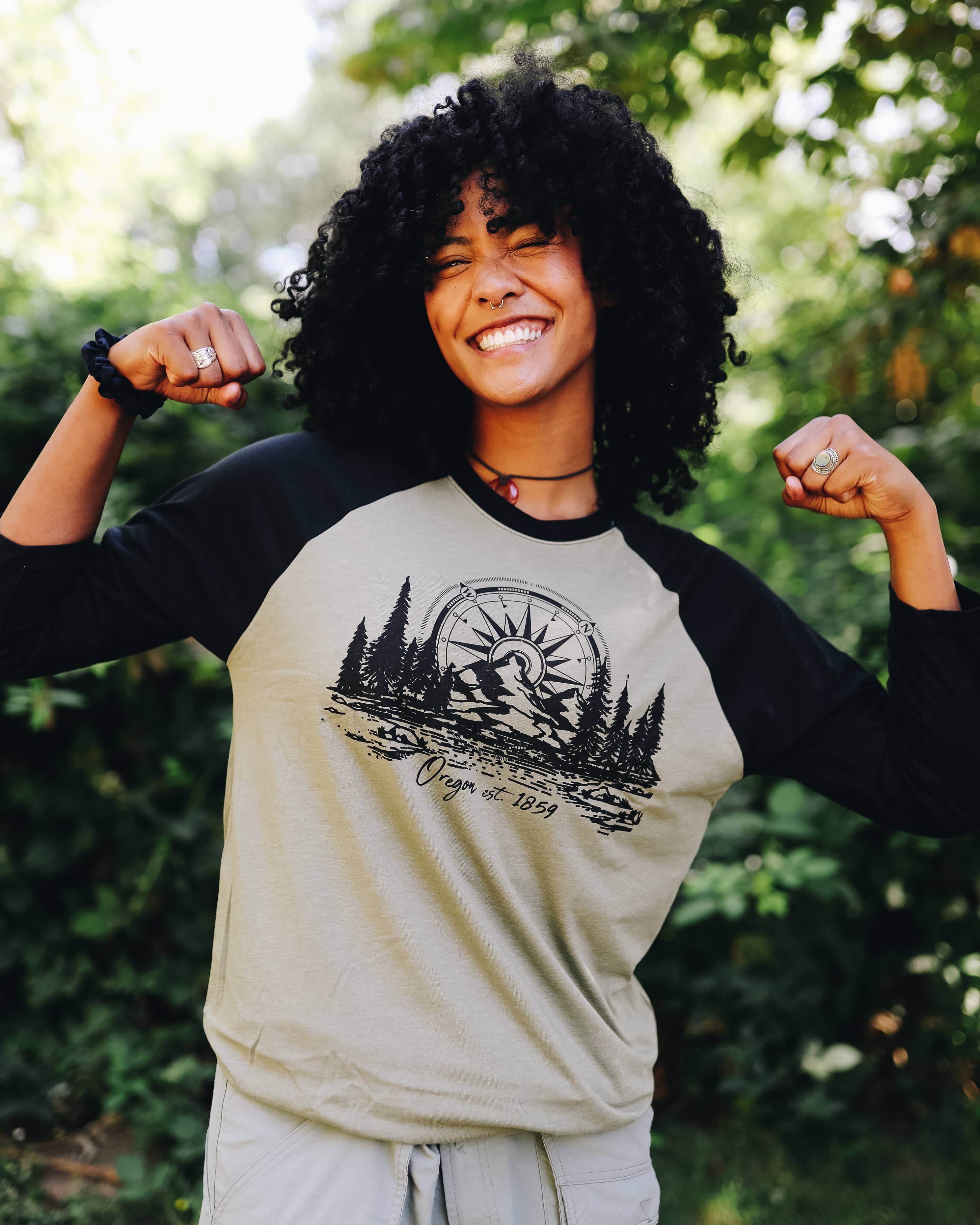 Model is wearing Oregon Compass 3/4 Sleeve Shirt in a Medium